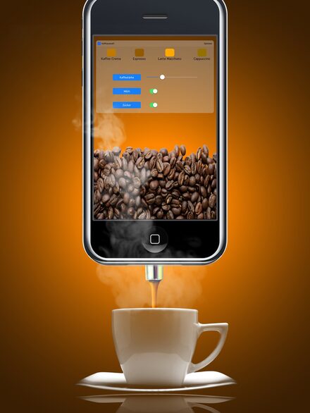 Bild zeigt ein Handy und eine Tasse Kaffee